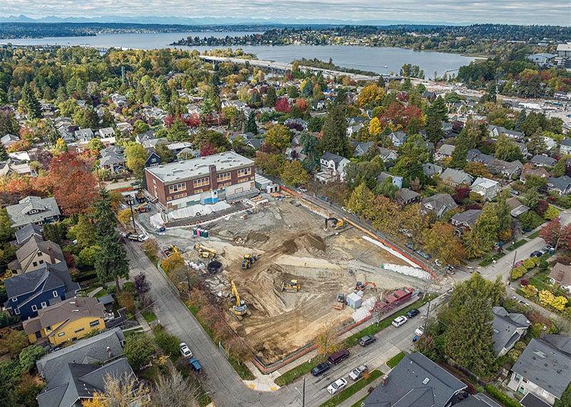 aerial view of a construction site next to a building